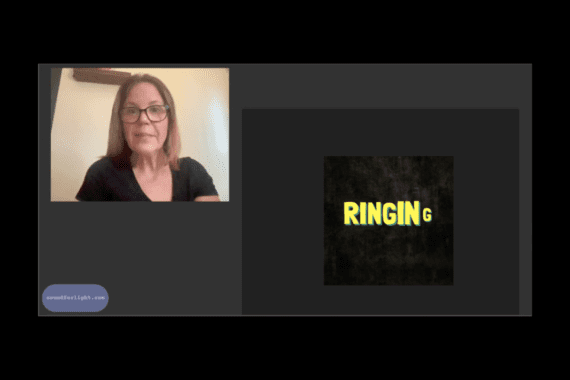 Deaf woman with glasses on videophone screen with ringing call notification